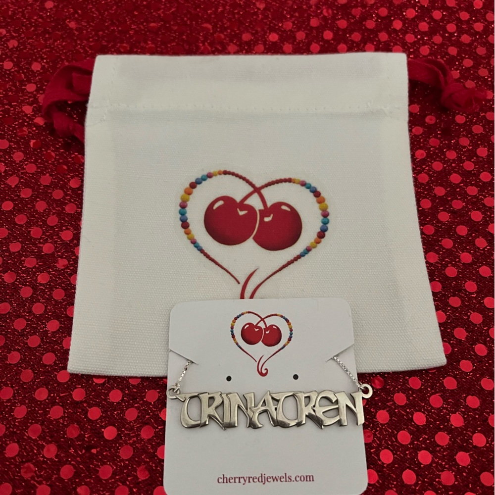 “TrinaTren” Silver personalized name necklace.